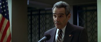 Movie still from “The Yards” (2000), directed by James Gray – A person wearing a suit and tie; Close Up shot, Low angle