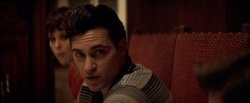 Movie still from “The Yards” (2000), directed by James Gray – A person sitting on a chair; Close Up shot, Over the shoulder angle