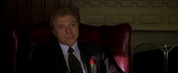 Movie still from “The Yards” (2000), directed by James Gray – A person wearing a suit and tie; Close Up shot, Low angle