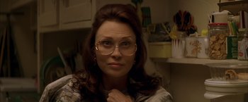 Movie still from “The Yards” (2000), directed by James Gray – A person wearing glasses; Close Up shot, Over the shoulder angle