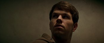 Movie still from “The Yards” (2000), directed by James Gray – A person looking up at the sky; Close Up shot, Low angle