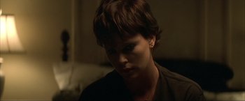 Movie still from “The Yards” (2000), directed by James Gray – A person with short brown hair; Close Up shot, Over the shoulder angle