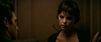 Movie still from “The Yards” (2000), directed by James Gray – A person with short brown hair; Close Up shot, Over the shoulder angle