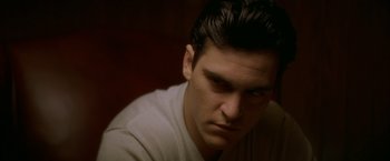 Movie still from “The Yards” (2000), directed by James Gray – A person looking at the camera; Close Up shot, Over the shoulder angle