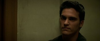 Movie still from “The Yards” (2000), directed by James Gray – A person with his eyes wide open; Close Up shot, Over the shoulder angle