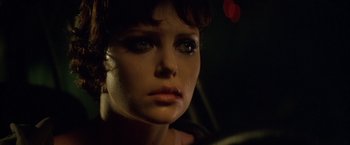 Movie still from “The Yards” (2000), directed by James Gray – A woman's face with tears coming out of her eyes; Close Up shot, Over the shoulder angle