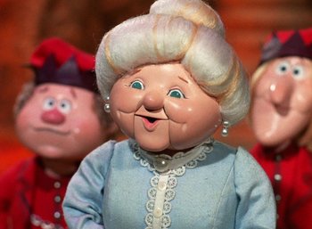 Movie still from “The Year Without a Santa Claus” (1974), directed by Jules Bass – The head of an old lady doll; Close Up shot, Low angle