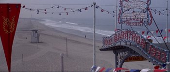 Movie still from “They Shoot Horses, Don't They?” (1969), directed by Sydney Pollack – A view of the beach from the boardwalk; Extreme Wide shot, High angle