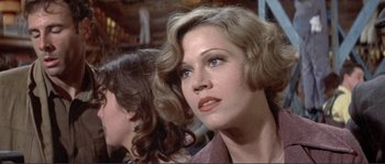 Movie still from “They Shoot Horses, Don't They?” (1969), directed by Sydney Pollack – A woman's face in a movie scene; Close Up shot, Over the shoulder angle