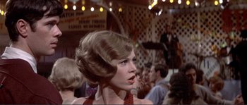 Movie still from “They Shoot Horses, Don't They?” (1969), directed by Sydney Pollack – A person wearing a dress; Close Up shot, Low angle