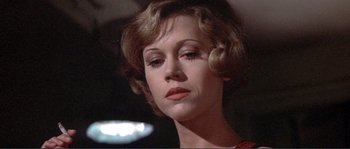 Movie still from “They Shoot Horses, Don't They?” (1969), directed by Sydney Pollack – A person with short hair; Close Up shot, Low angle