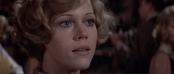 Movie still from “They Shoot Horses, Don't They?” (1969), directed by Sydney Pollack – A woman's face in a movie scene; Close Up shot, Over the shoulder angle