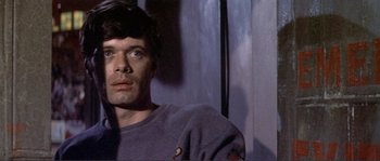 Movie still from “They Shoot Horses, Don't They?” (1969), directed by Sydney Pollack – A person wearing a sweatshirt; Close Up shot, Low angle