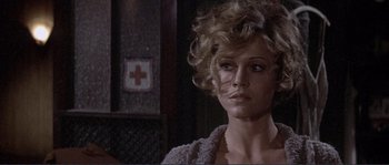 Movie still from “They Shoot Horses, Don't They?” (1969), directed by Sydney Pollack – A person wearing a sweater; Close Up shot, Low angle