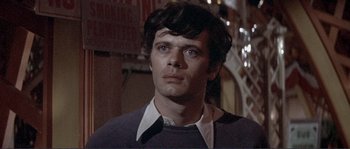 Movie still from “They Shoot Horses, Don't They?” (1969), directed by Sydney Pollack – A person wearing a sweater; Close Up shot, Low angle