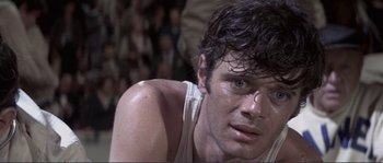 Movie still from “They Shoot Horses, Don't They?” (1969), directed by Sydney Pollack – A person with wet hair; Close Up shot, Low angle