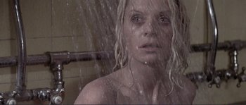 Movie still from “They Shoot Horses, Don't They?” (1969), directed by Sydney Pollack – A woman in the shower with water running all over her body; Close Up shot, Low angle