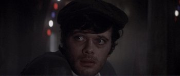 Movie still from “They Shoot Horses, Don't They?” (1969), directed by Sydney Pollack – A person wearing a hat; Close Up shot, Low angle