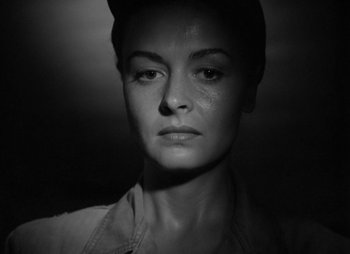 Movie still from “They Were Expendable” (1945), directed by Robert Montgomery – A black - and - white photo of a woman's face; Close Up shot, Low angle