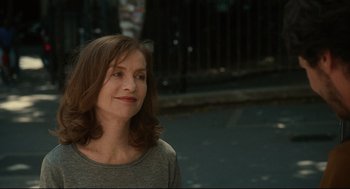A person wearing a gray shirt