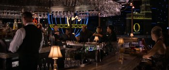 Movie still from “Think Like a Man Too” (2014), directed by Tim Story – A group of people sitting around a bar; Wide shot, High angle