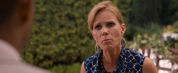 Movie still from “Think Like a Man Too” (2014), directed by Tim Story – A person wearing a necklace; Close Up shot, Over the shoulder angle