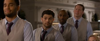 Movie still from “Think Like a Man Too” (2014), directed by Tim Story – A group of men standing next to each other wearing ties; Medium shot, Over the shoulder angle
