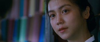 Movie still from “Thirst” (2009), directed by Park Chan-wook – A young girl's face; Close Up shot, Low angle