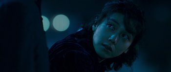 Movie still from “Thirst” (2009), directed by Park Chan-wook – A young woman is looking at the camera; Close Up shot, Low angle