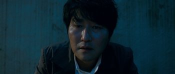 Movie still from “Thirst” (2009), directed by Park Chan-wook – A person wearing a jacket; Close Up shot, High angle