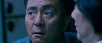 Movie still from “Thirst” (2009), directed by Park Chan-wook – A man's eyes and face; Close Up shot, High angle