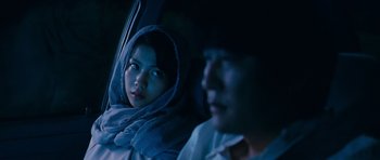 Movie still from “Thirst” (2009), directed by Park Chan-wook – A man and a woman sitting in the back of a car; Close Up shot, Over the shoulder angle