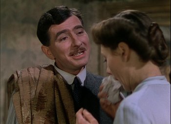 Movie still from “This Happy Breed” (1944), directed by David Lean – A man and a woman talking to each other; Close Up shot, Low angle
