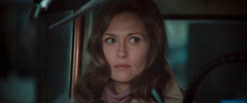 Movie still from “Three Days of the Condor” (1975), directed by Sydney Pollack – A person with long hair; Close Up shot, Over the shoulder angle
