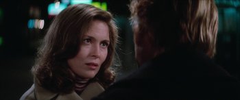 Movie still from “Three Days of the Condor” (1975), directed by Sydney Pollack – A person talking to another person; Close Up shot, Over the shoulder angle