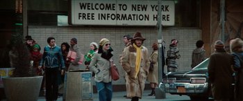 Movie still from “Three Days of the Condor” (1975), directed by Sydney Pollack – A group of people walking down a street; Wide shot, High angle