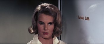 Movie still from “Thunderball” (1965), directed by Terence Young – A person wearing a white shirt; Close Up shot, Low angle