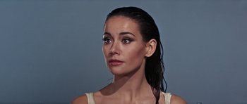 Movie still from “Thunderball” (1965), directed by Terence Young – A person wearing a white shirt; Close Up shot, Low angle