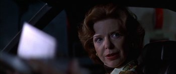 Movie still from “Thunderbolt and Lightfoot” (1974), directed by Michael Cimino – An older woman is looking at the camera; Close Up shot, Low angle