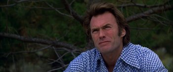 Movie still from “Thunderbolt and Lightfoot” (1974), directed by Michael Cimino – A person wearing a blue shirt; Close Up shot, Low angle