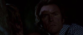 Movie still from “Thunderbolt and Lightfoot” (1974), directed by Michael Cimino – A man's face in the dark; Close Up shot, Low angle