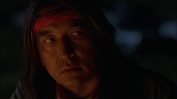 Movie still from “Thunderheart” (1992), directed by Michael Apted – A person wearing a bandanna; Close Up shot, Low angle