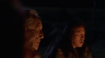 Movie still from “Thunderheart” (1992), directed by Michael Apted – Two older people are standing in the dark; Close Up shot, Low angle