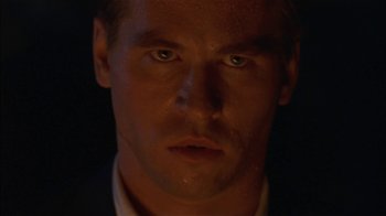 Movie still from “Thunderheart” (1992), directed by Michael Apted – A man's face in the dark; Close Up shot, Low angle