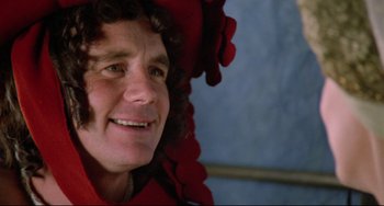 Movie still from “Time Bandits” (1981), directed by Terry Gilliam – A person wearing a hat; Close Up shot, Over the shoulder angle