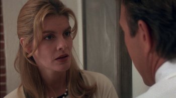 Movie still from “Tin Cup” (1996), directed by Ron Shelton – A man and a woman talking in front of a mirror; Close Up shot, Over the shoulder angle