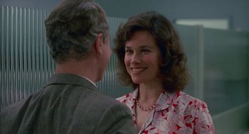 Movie still from “Tin Men” (1987), directed by Barry Levinson – An older man and a young woman are talking; Close Up shot, Over the shoulder angle