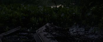 A boat that is sitting in the grass