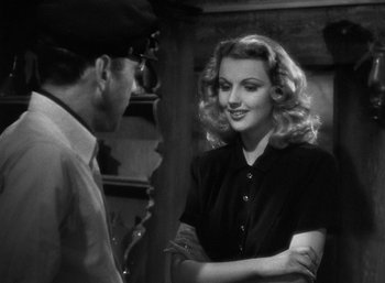 Movie still from “To Have and Have Not” (1944), directed by Howard Hawks – A man and a woman talking to each other; Medium shot, Over the shoulder angle