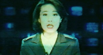 Movie still from “Happy Together” (1997), directed by Kar-Wai Wong – A woman in a military uniform is speaking; Close Up shot, Low angle